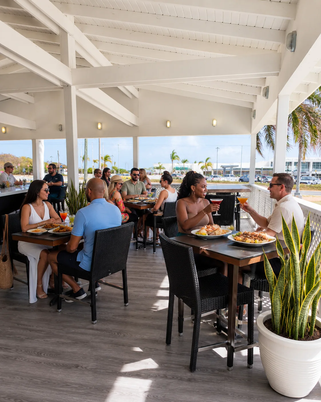 Tourists enjoying food and cocktails